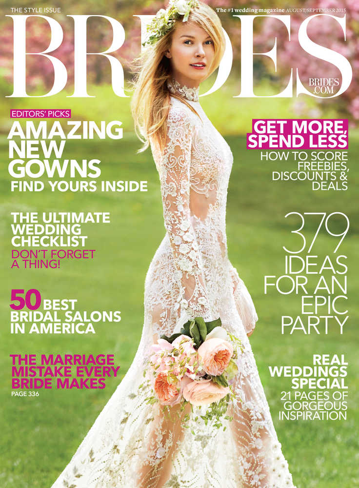 This photo provided by Brides shows an embroidered couture gown by Reem Acra featured on the August/September 2015 cover of "Brides" magazine. Some brides are stealing from the red carpets and going more risque for the big days with illusion styles, cut outs and ultra-sexy backs. (Derek Kettela/Brides via AP)